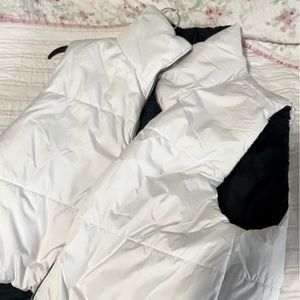 Reversible white and black puffer vest